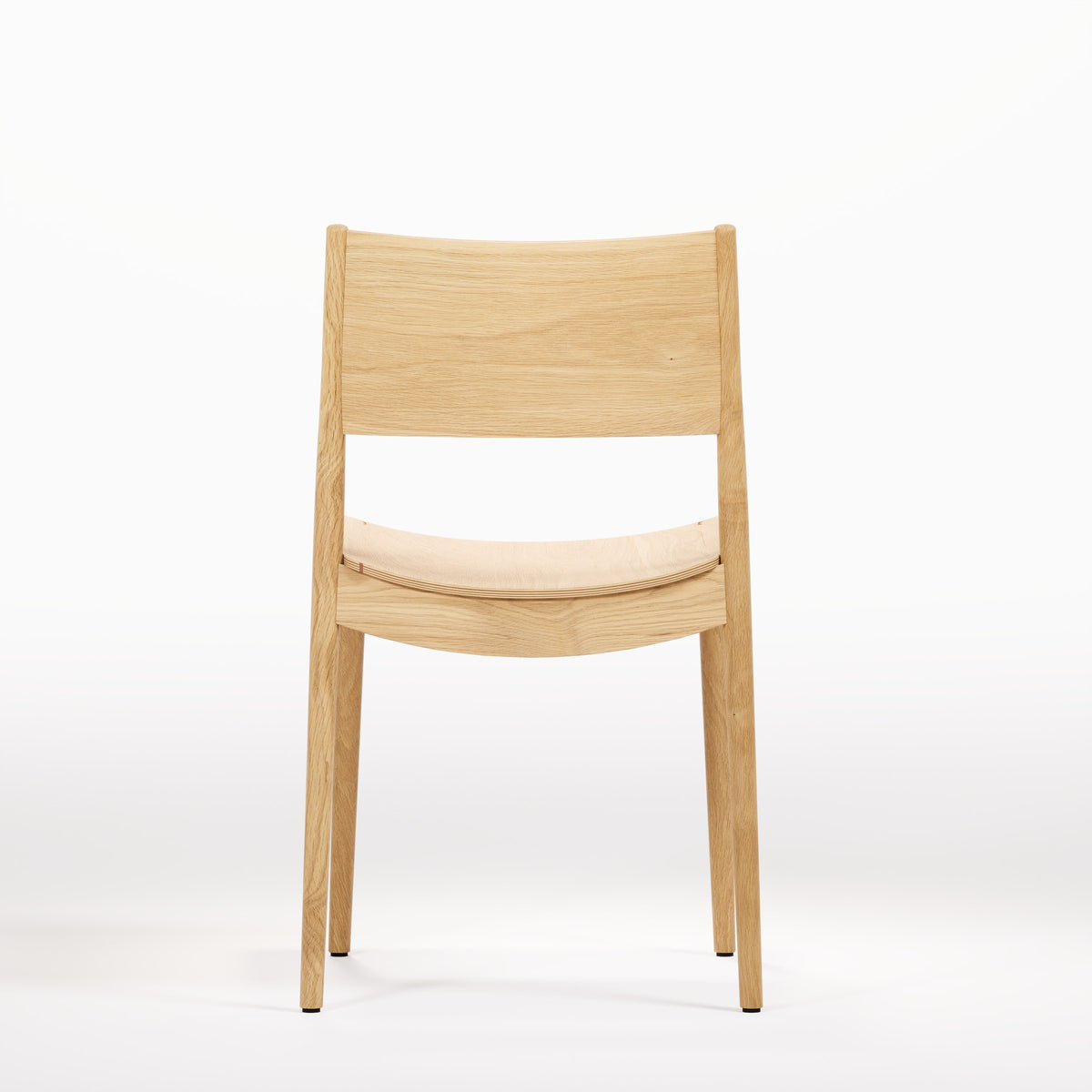 Chaise empilable Vio en chêne naturel vue de dos