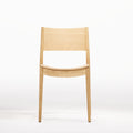 Chaise empilable Vio en chêne naturel vue de face