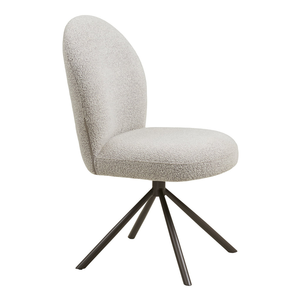 Chaise Lana bouclé sable vue trois quarts profil silhouette sculpturale dossier ogive
