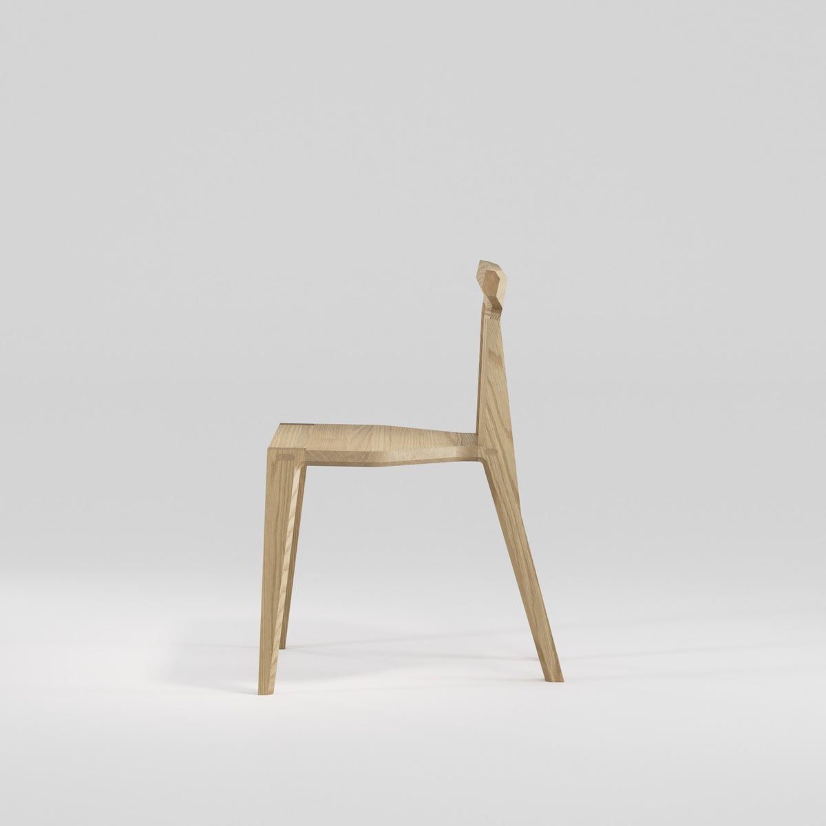 Chaise Orca en chêne naturel vue de profil