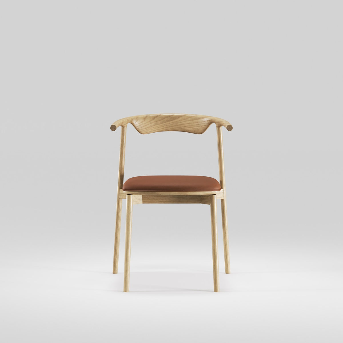 Chaise Pala en chêne et cuir cognac vue de face