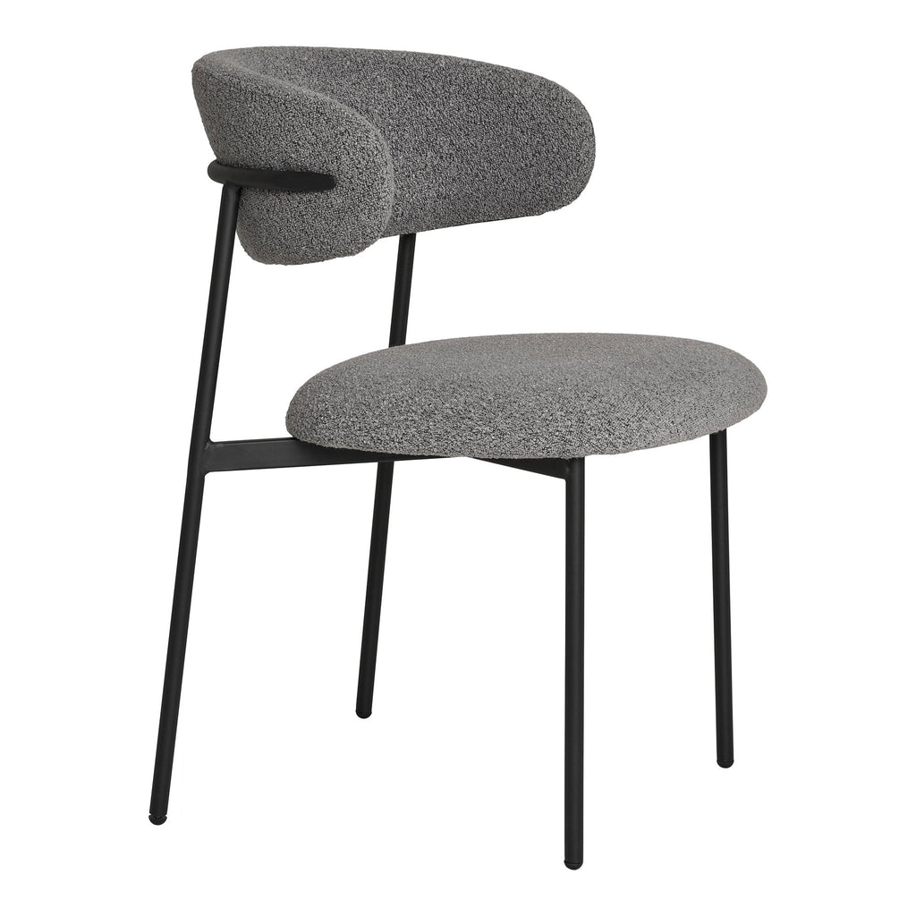 Chaise Mira bouclé gris clair vue de profil dossier flottant assise ronde pieds métal