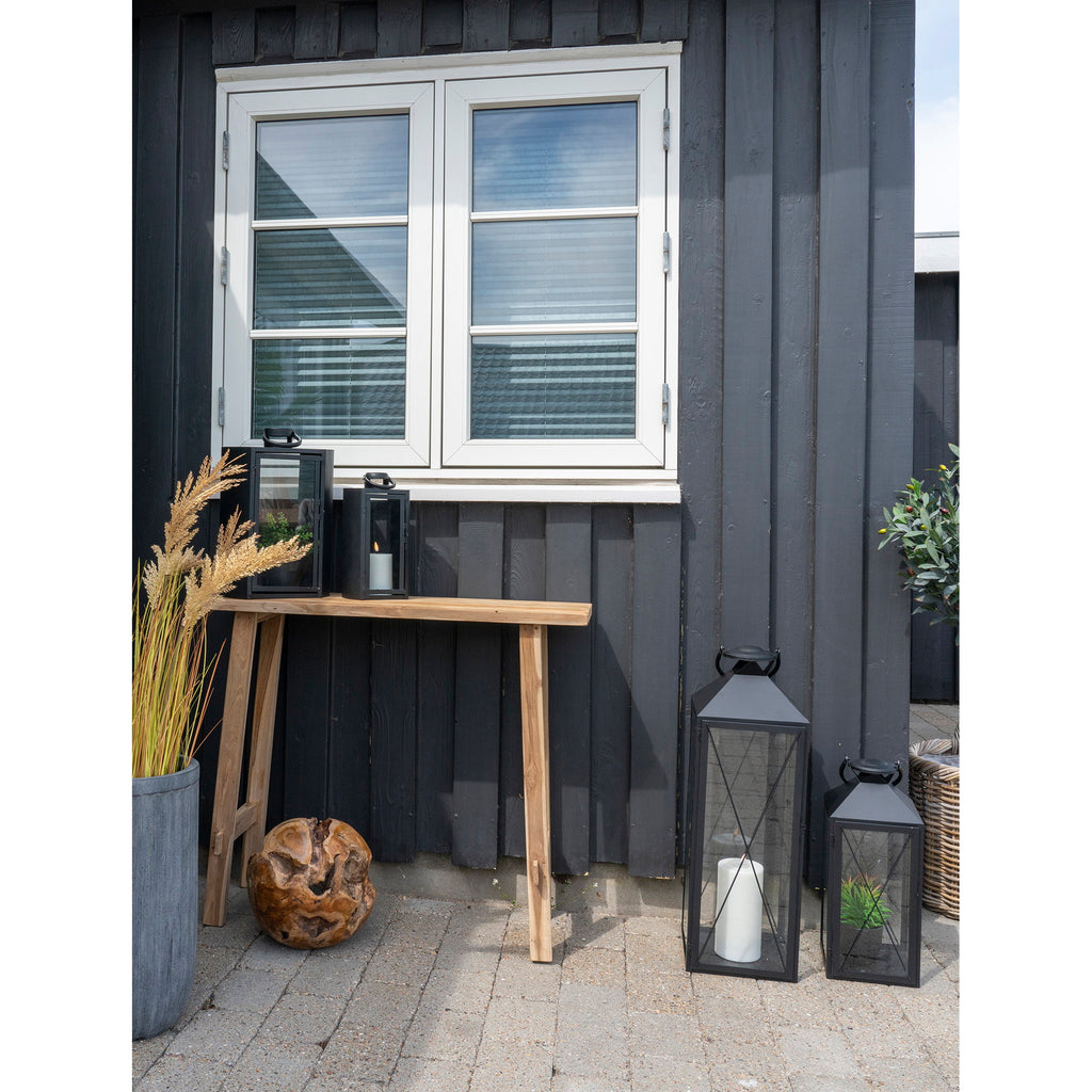 Console Girona teck recyclé usage extérieur terrasse lanternes noires herbes séchées