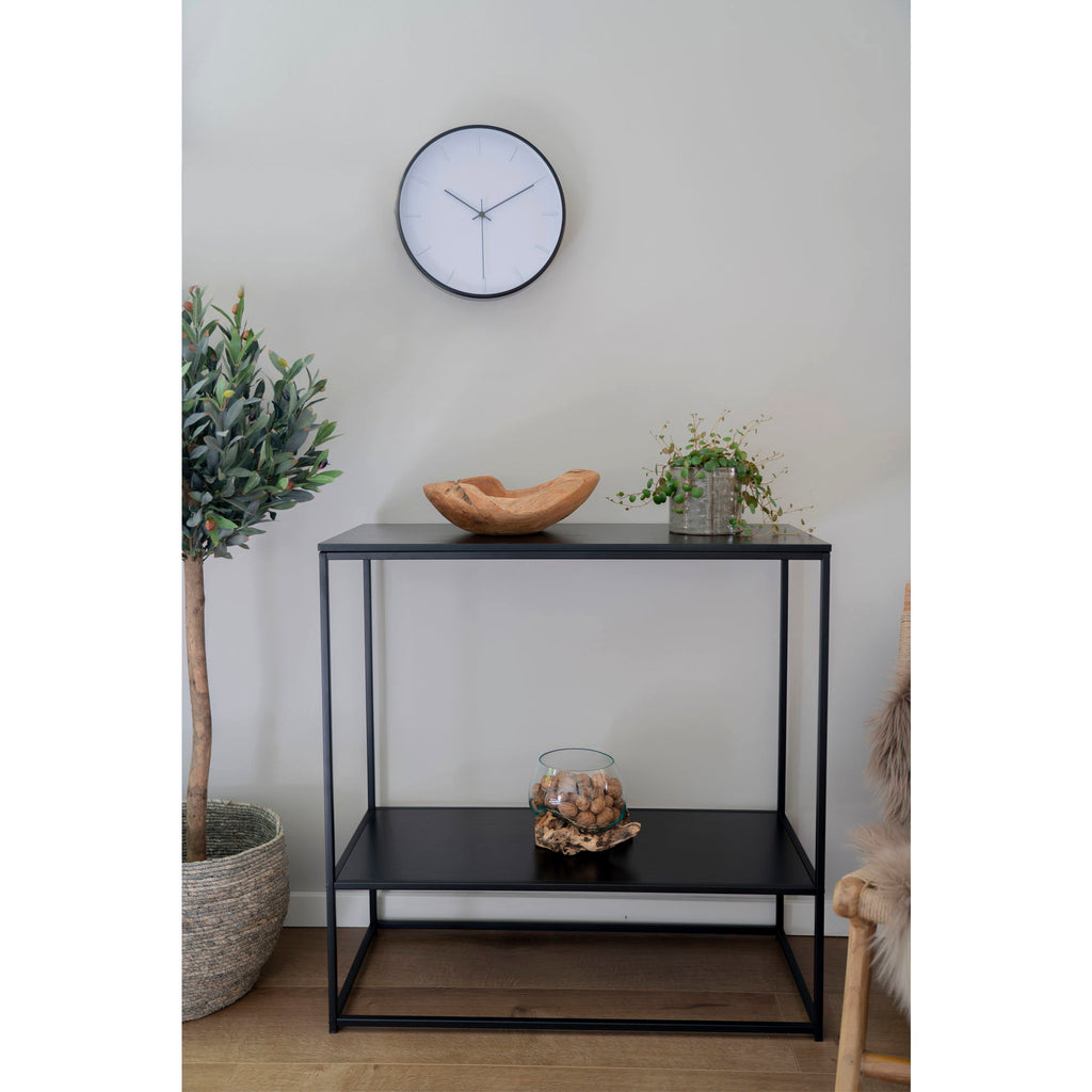 Console Vita noir mise en scène salon coupe bois olivier pendule plante verte
