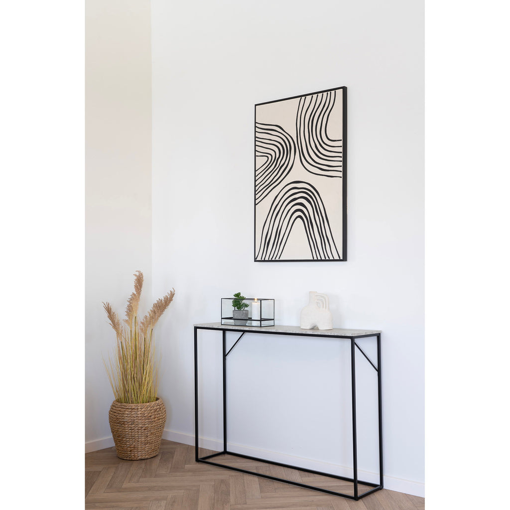 Console Vita travertin métal noir mise en scène entrée tableau abstrait herbes séchées parquet chevrons