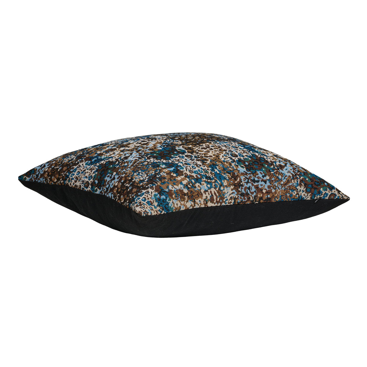 Coussin Blossom couché de profil montrant la face jacquard et le dos uni noir