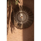 Disque mural Raffia Macramé 60 cm centre blanc en situation