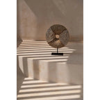 Disque de perles et cauris sur socle 24 cm en situation