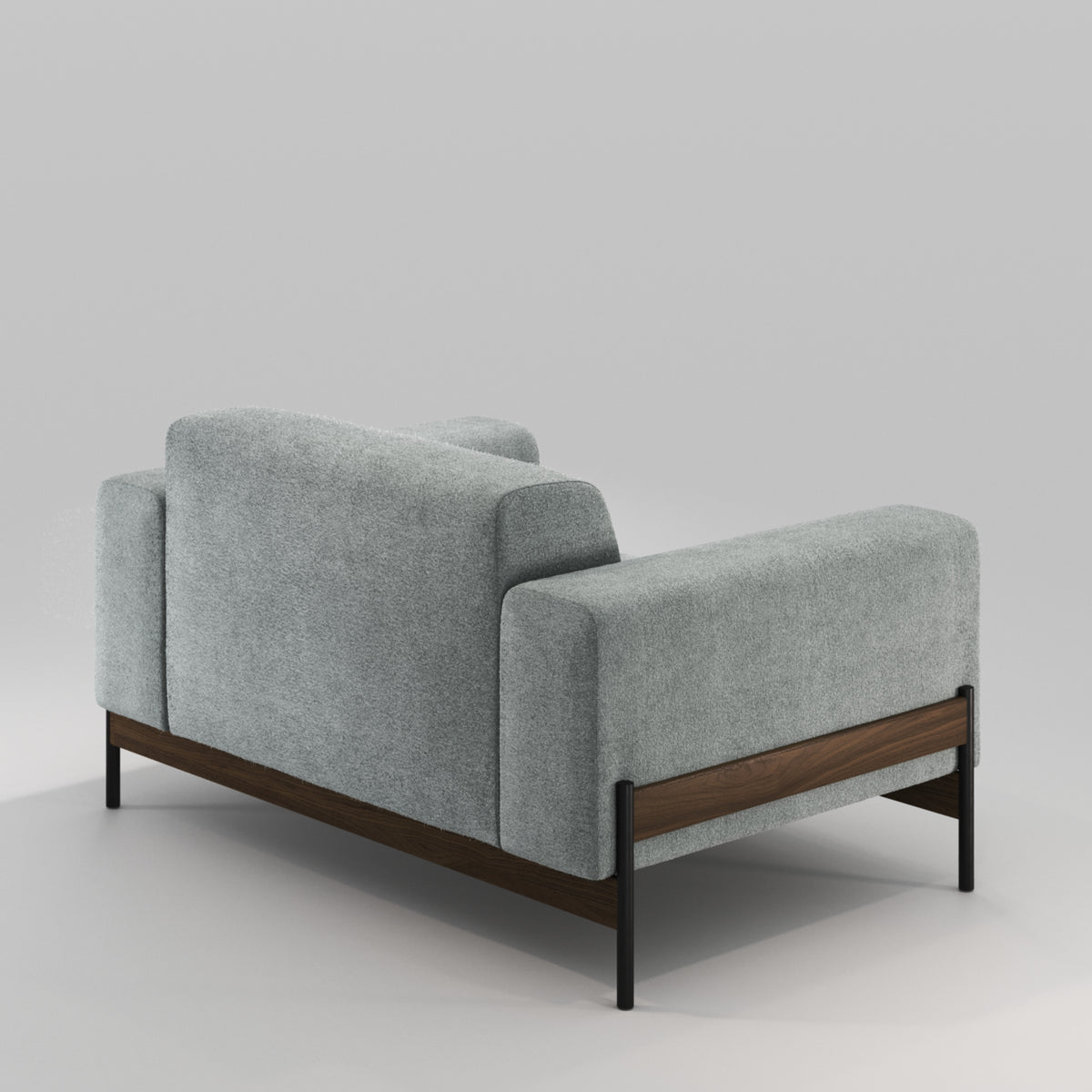 Fauteuil Bowie en noyer et tissu gris-vert vu de trois quarts arrière, de près