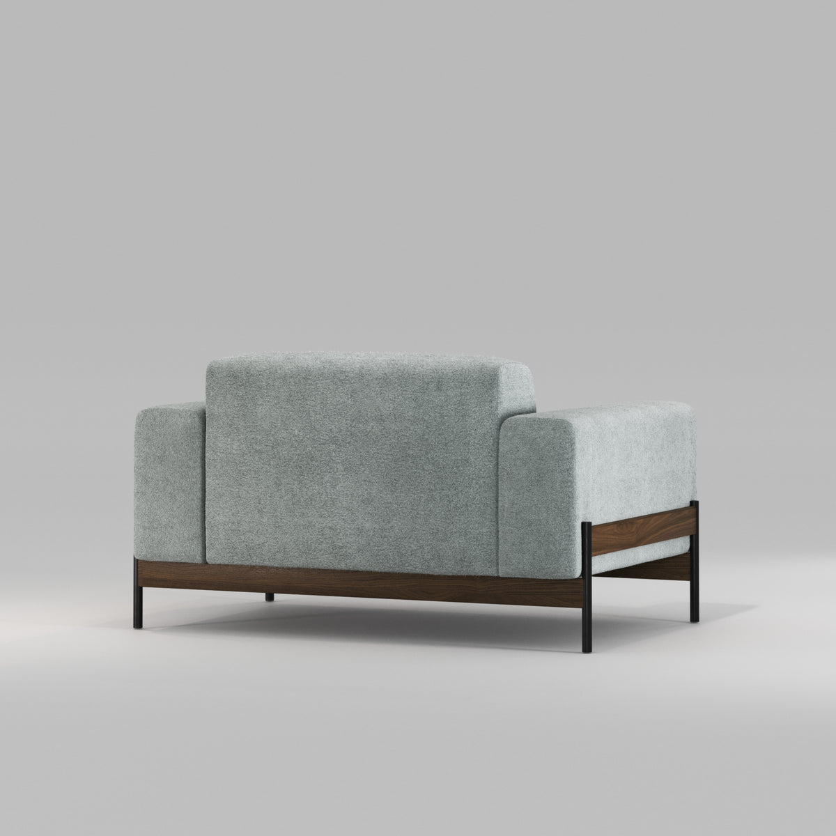 Fauteuil Bowie en noyer et tissu gris-vert vu de trois quarts arrière