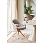 4 fauteuils pivotants Dover bouclé brun autour d'une table ronde blanche salle à manger contemporaine