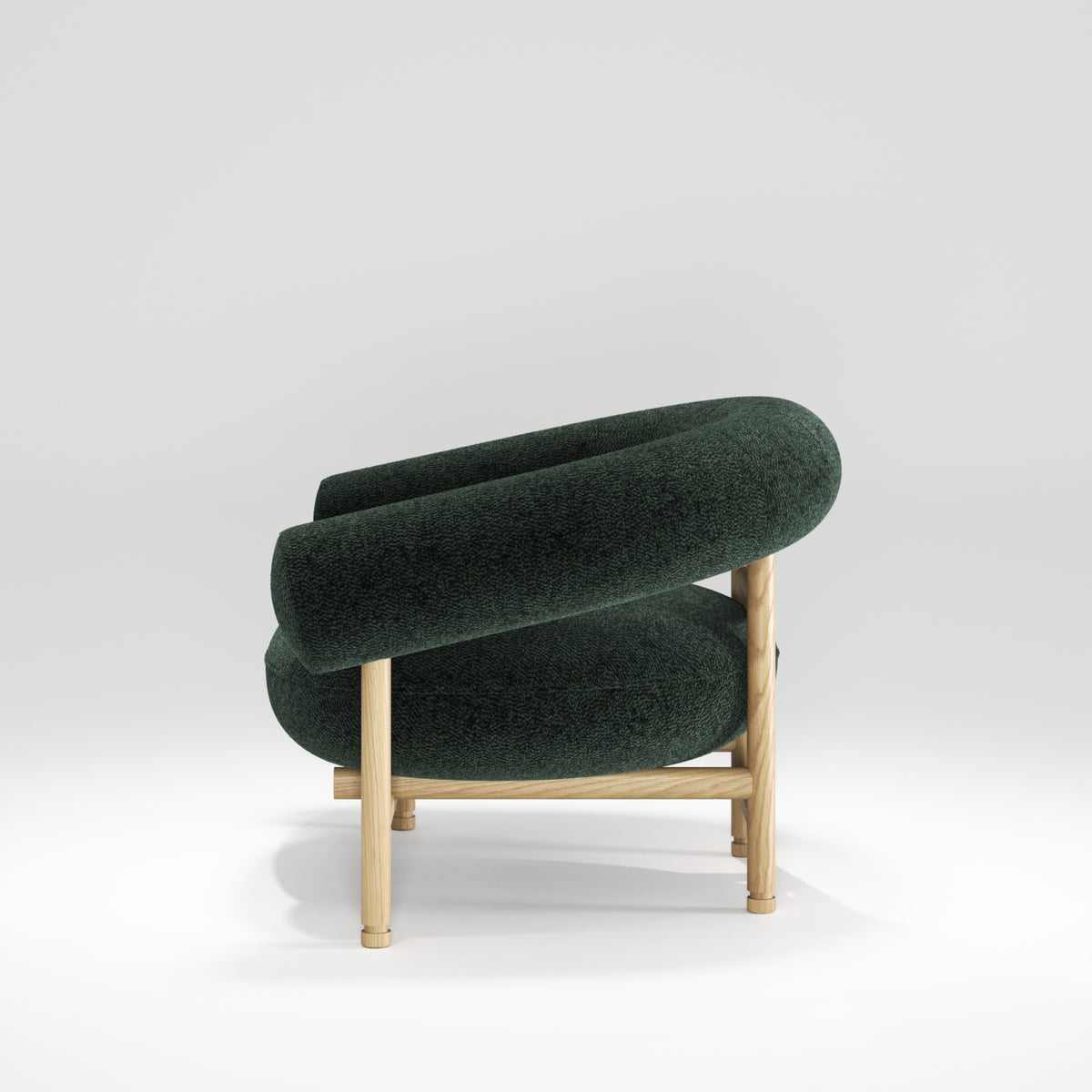 Fauteuil lounge Loop en chêne et tissu vert forêt vu de profil