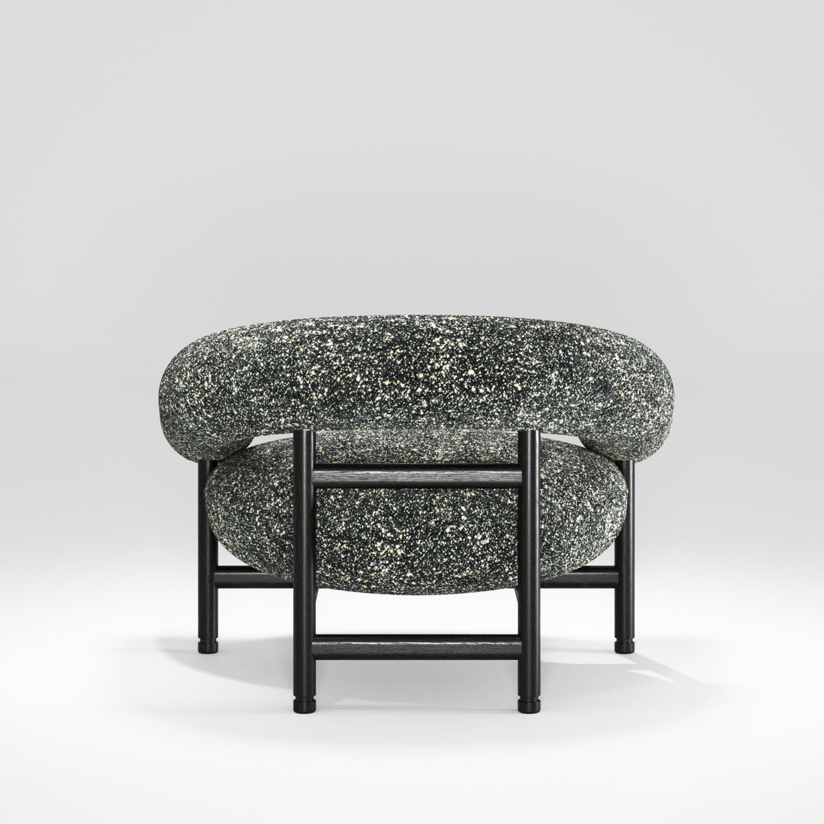 Fauteuil lounge Loop en chêne noir et tissu moucheté vu de dos