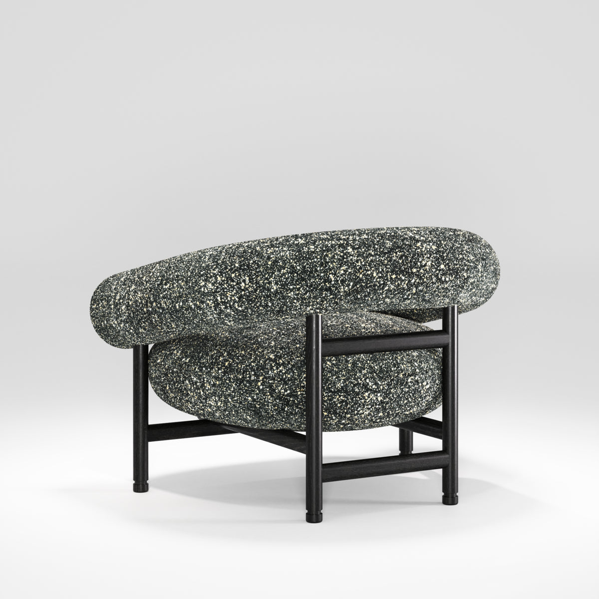 Fauteuil lounge Loop en chêne noir et tissu moucheté vu de trois quarts arrière