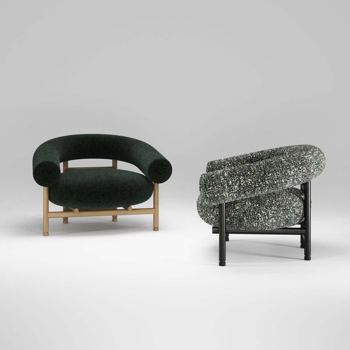 Fauteuils lounge Loop en chêne et tissu vert forêt et en chêne noir et tissu moucheté, côte à côte