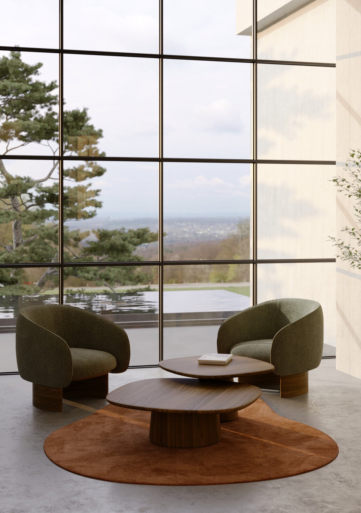Deux fauteuils lounge Nido en tissu vert foncé autour d'une table basse, devant une baie vitrée