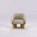 Fauteuil lounge Nido en chêne et tissu écru vu de face