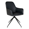 Fauteuil de table Harbo pivotant en simili cuir noir matelassé losanges avec pied étoile acier noir vue trois quarts