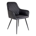 Fauteuil de table Harbo noir en simili cuir matelassé losanges avec pieds acier noir vue trois quarts