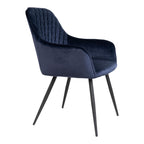 Fauteuil de table Harbo velours bleu nuit vue de profil accoudoirs enveloppants pieds métal noir
