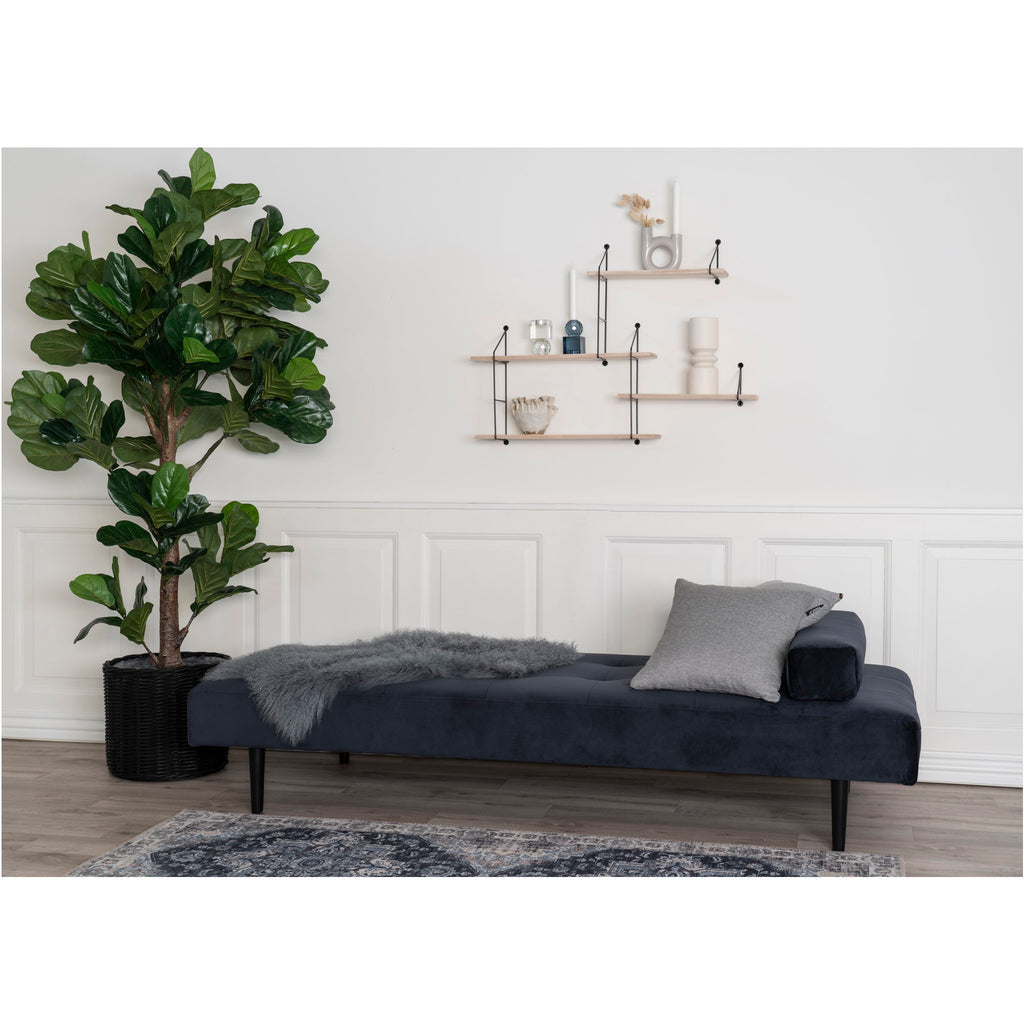 Ficus lyrata artificiel vert 190cm dans panier rotin noir aux côtés méridienne velours sombre salon blanc