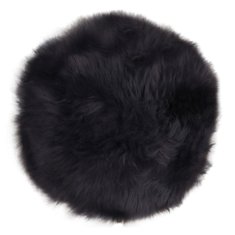 Galette de chaise ronde vraie peau d'agneau noire Ø35 cm poil naturel long soyeux vue du dessus