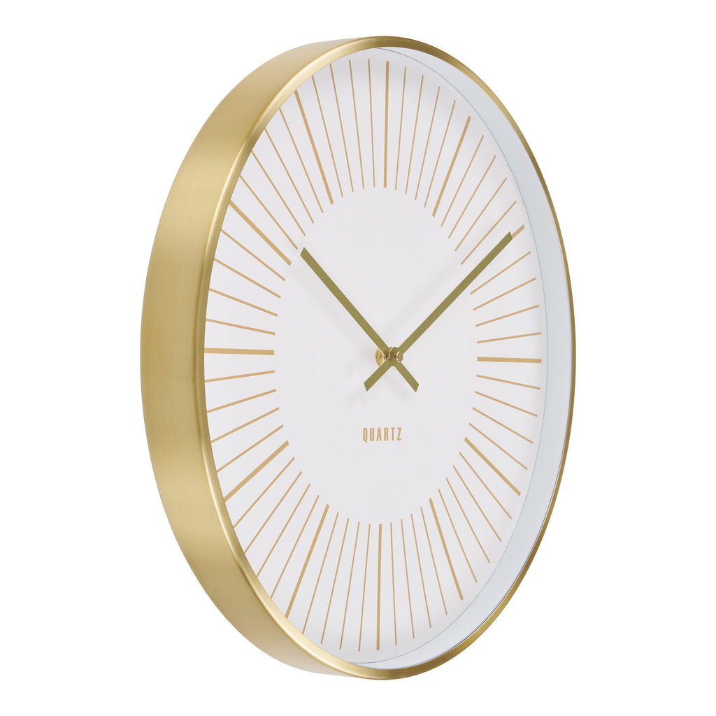 Horloge Takamaka aluminium doré brossé cadran blanc aiguilles dorées vue trois quarts
