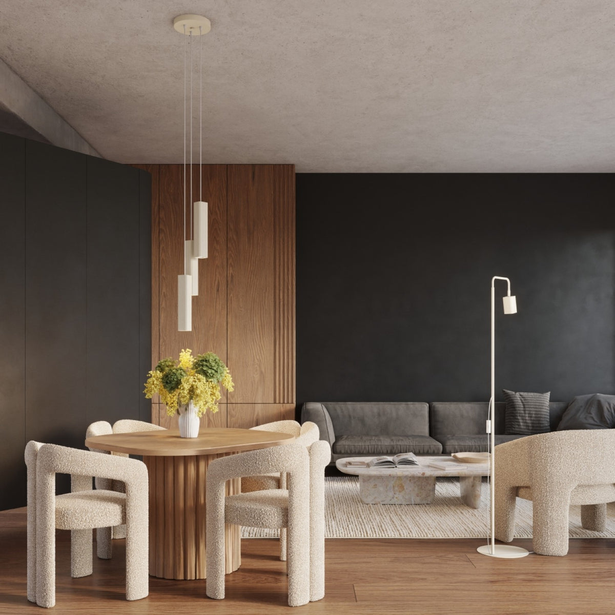 Lampadaire Rayo 1 laque beige au bout d'un canapé avec une suspension Rayo trois spots au-dessus de la table
