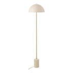 Lampadaire Sheffield à abat-jour demi-sphère beige mat tige dorée et socle cylindrique en travertin sur fond blanc