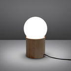 Lampe à poser Boomo bois et verre opale G9 allumée, halo opale doux