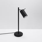 Lampe à poser Ring noir de profil, tête orientable et pied fin
