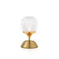Lampe à poser sans fil Glow Sinatra en métal doré avec globe transparent taillé en pointes de diamant