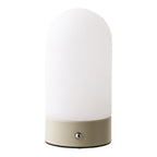 Lampe de table rechargeable Ashford capsule striée en PE blanc sur socle en métal beige mat avec bouton chromé