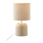 Lampe Morley grise allumée abat-jour bouclette beige lumière chaude tamisée