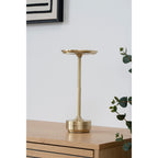 Lampe rechargeable Lyneham laiton doré posée sur commode bois clair ambiance salon