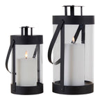 Deux lanternes Bondi en acier noir et verre petite et grande avec une bougie pilier allumée