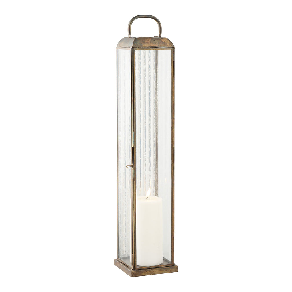 Grande lanterne photophore Herslev 60cm avec bougie pilier allumée, reflets verre strié