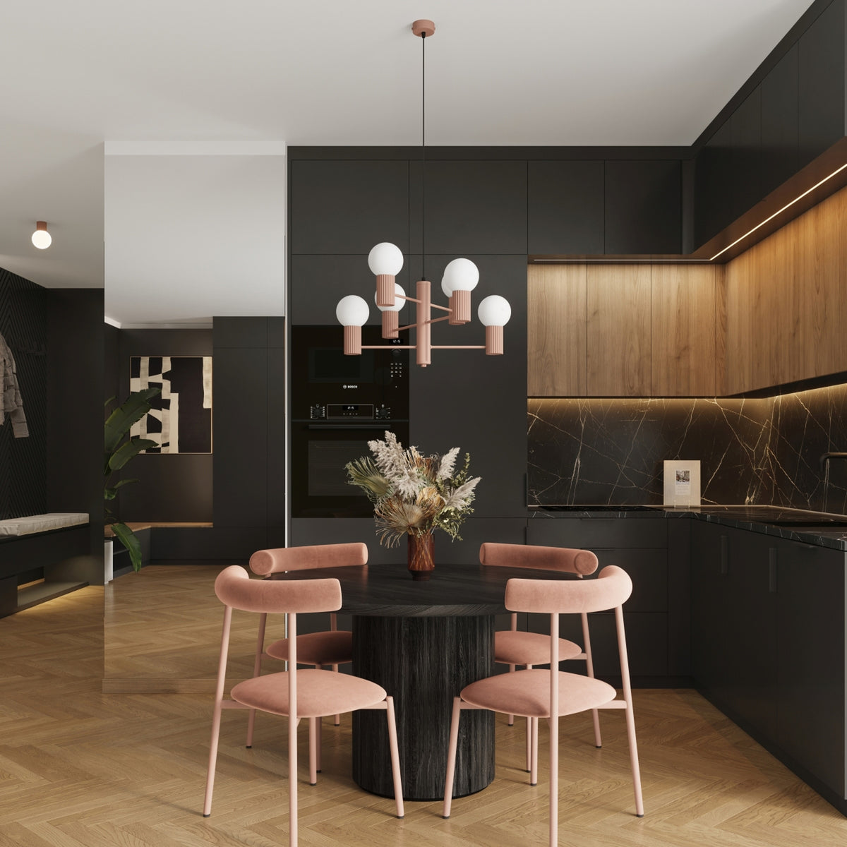 Lustre Halo laque brun moka au-dessus d'une table ronde en bois sombre entourée de quatre chaises dans une cuisine ouverte