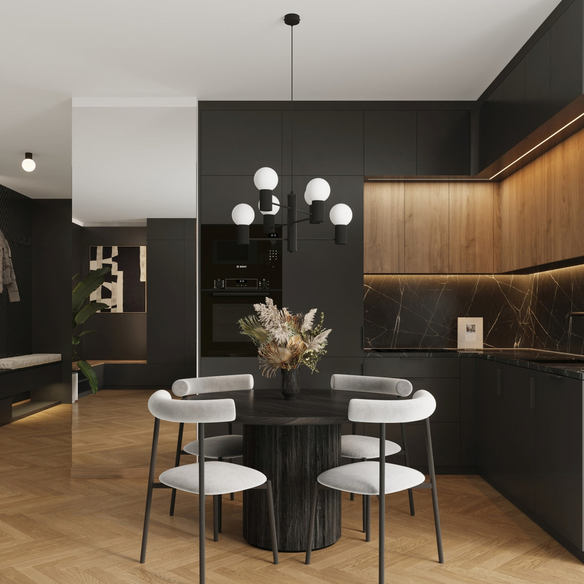 Lustre Halo laque noire au-dessus d'une table ronde en bois sombre entourée de quatre chaises dans une cuisine ouverte