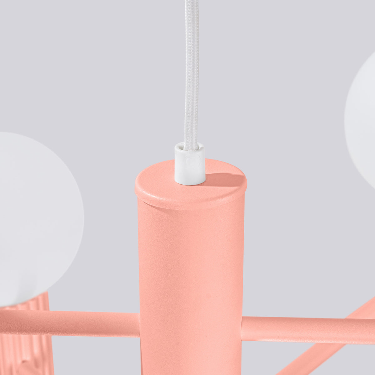 Haut du fût laque rose pêche avec le passe-câble et le câble tressé blanc