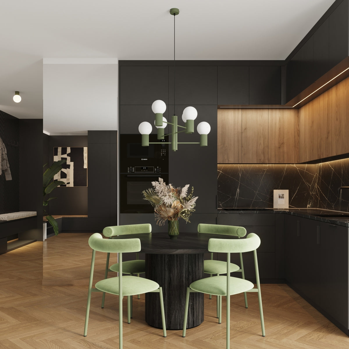 Lustre Halo laque vert olive au-dessus d'une table ronde en bois sombre entourée de quatre chaises dans une cuisine ouverte