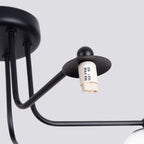 Lustre Astral 5 boules opale acier noir G9 dans un intérieur
