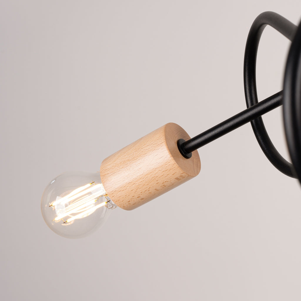 Lustre Ember 3 bois et métal noir E27 dans un intérieur
