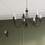 Lustre Minerwa 3 noir et appliques assorties dans une salle à manger