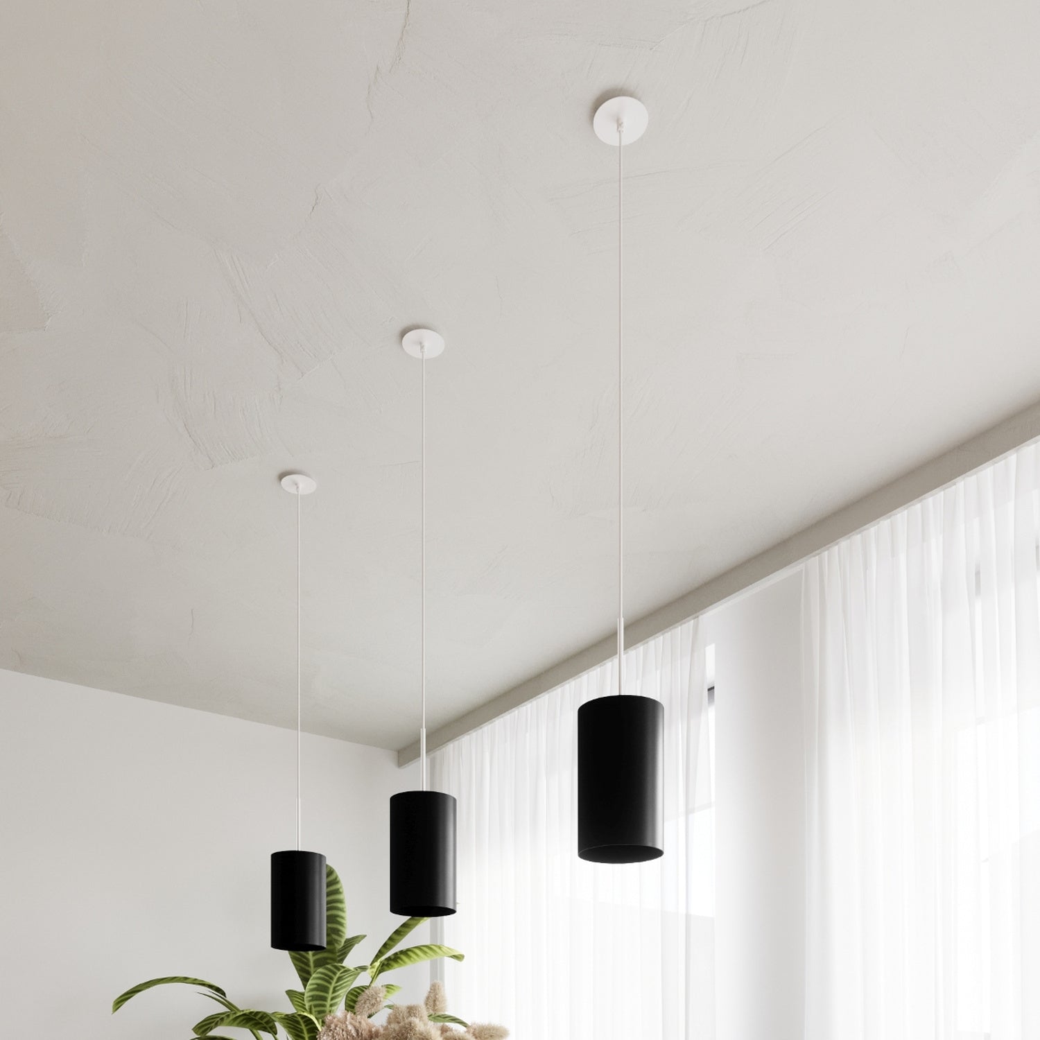 Lustre Otto 50 en tissu noir dans une pièce de vie lumineuse