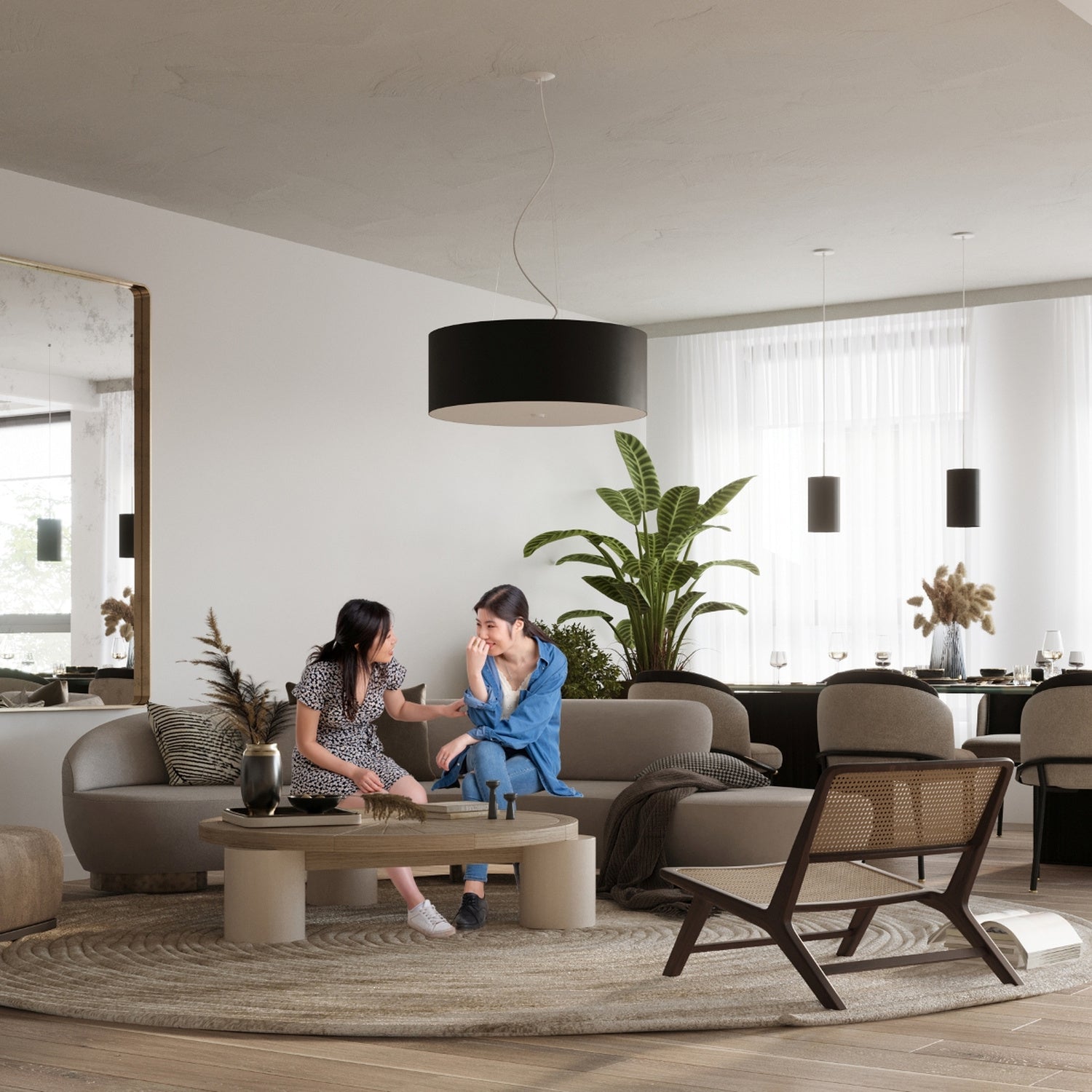 Lustre Otto 50 en tissu noir suspendu dans un intérieur contemporain