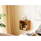 Module Townsville chêne niche ouverte en situation chambre chevet avec horloge et bougie