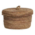 Panier Desio en feuille de bananier fermé avec son anse en corde vu de face