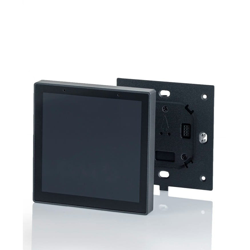 Panneau de commande Magnetic noir posé devant sa plaque de montage percée de trous de fixation