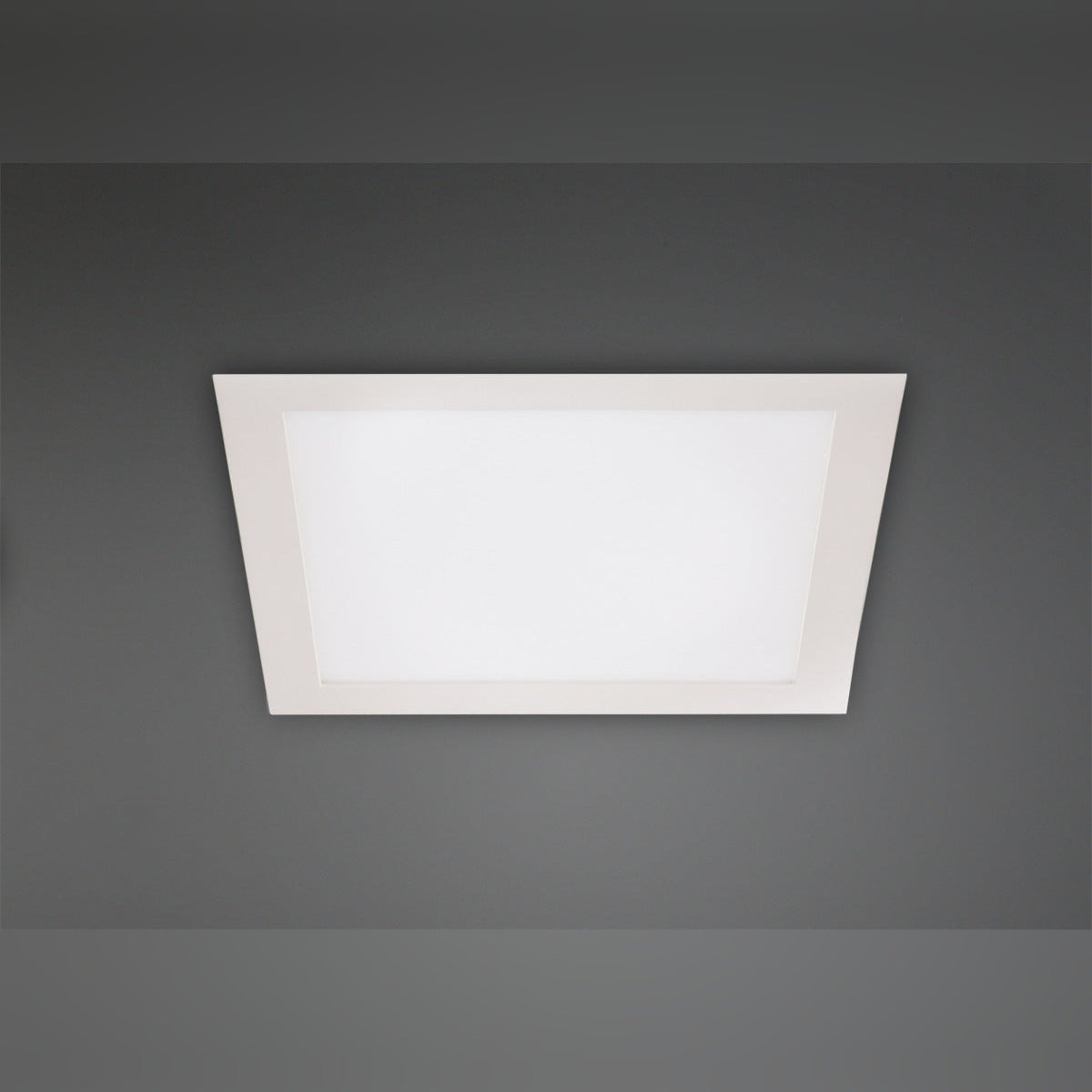Panneau LED encastrable Panelled carré blanc allumé encastré dans un plafond gris